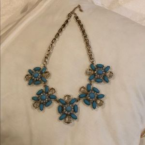 Gold tone and turquoise statement necklace.